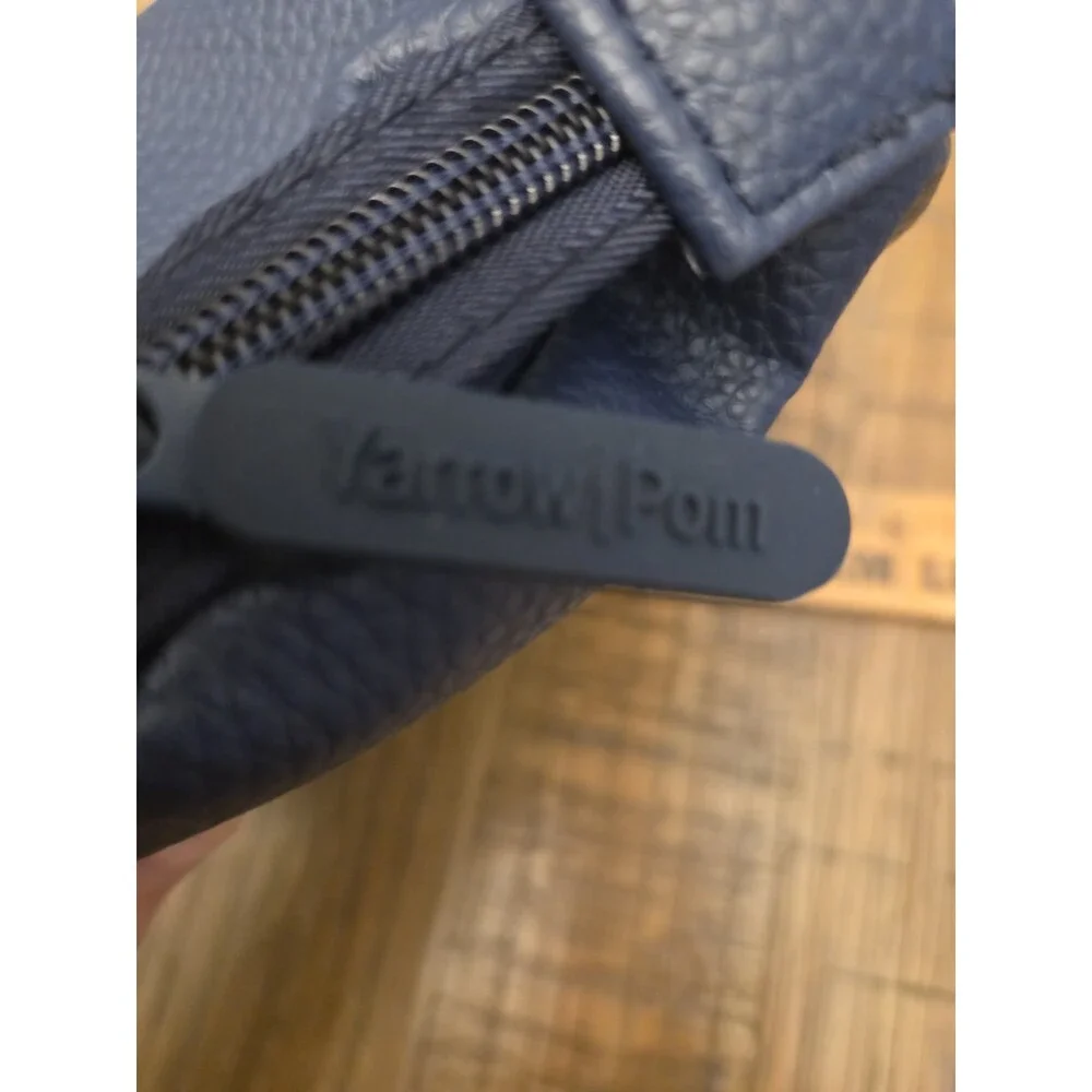 doTERRA Yarrow Pom pouch has a pebble-grain texture and durable construction